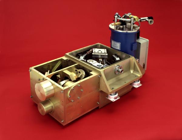 TAFTS with teh covers off: pointing / calibration box (left), vacuum chamber and interferometer (centre) and helium cryostat housing detectors and analyser optics (right).